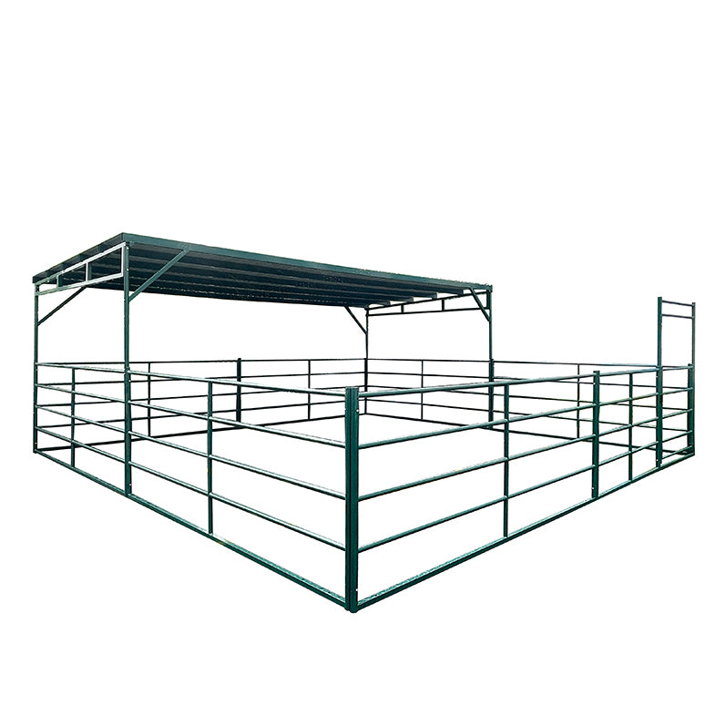 12ft by 24ft modular livestock shelter with green metal roof canopy and corral panel fencing for cattle and horse protection