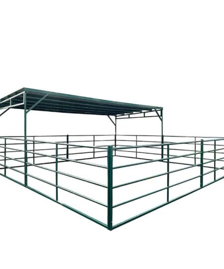 12ft by 24ft modular livestock shelter with green metal roof canopy and corral panel fencing for cattle and horse protection