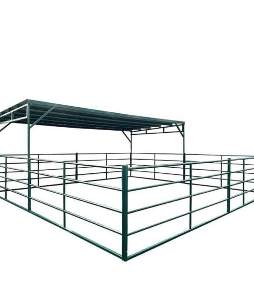 12ft by 24ft modular livestock shelter with green metal roof canopy and corral panel fencing for cattle and horse protection