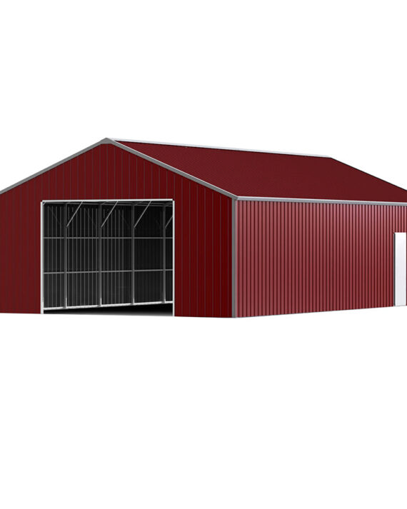 Red metal barn with a large door on a white background